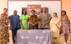 Team members from Academic City and Arima Resources in a group photograph.