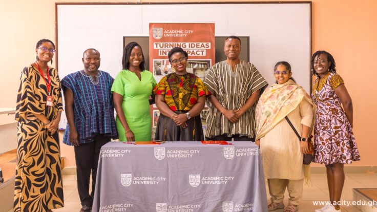 Team members from Academic City and Arima Resources in a group photograph.